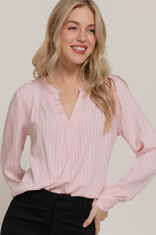 Blusa plisada de manga larga