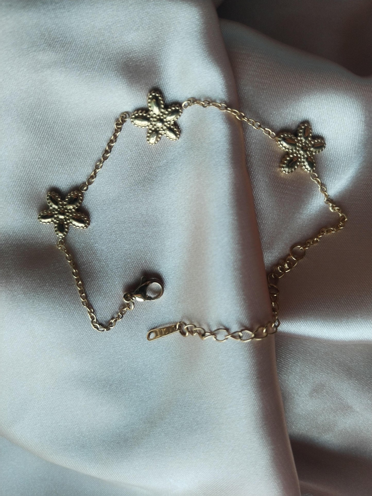Pulsera color oro flor