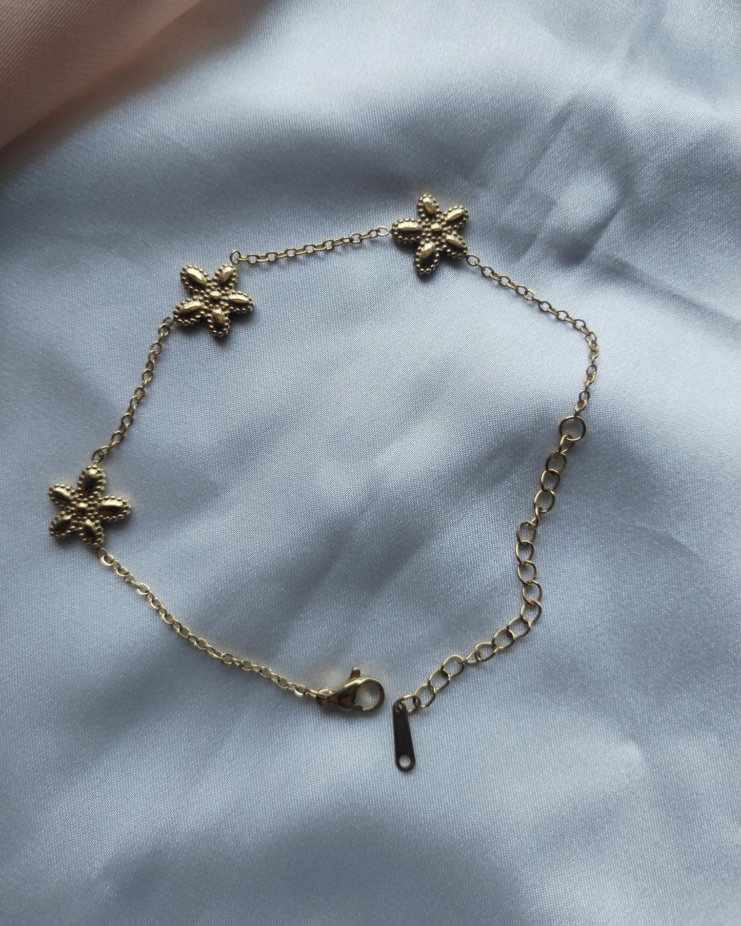 Pulsera color oro flor