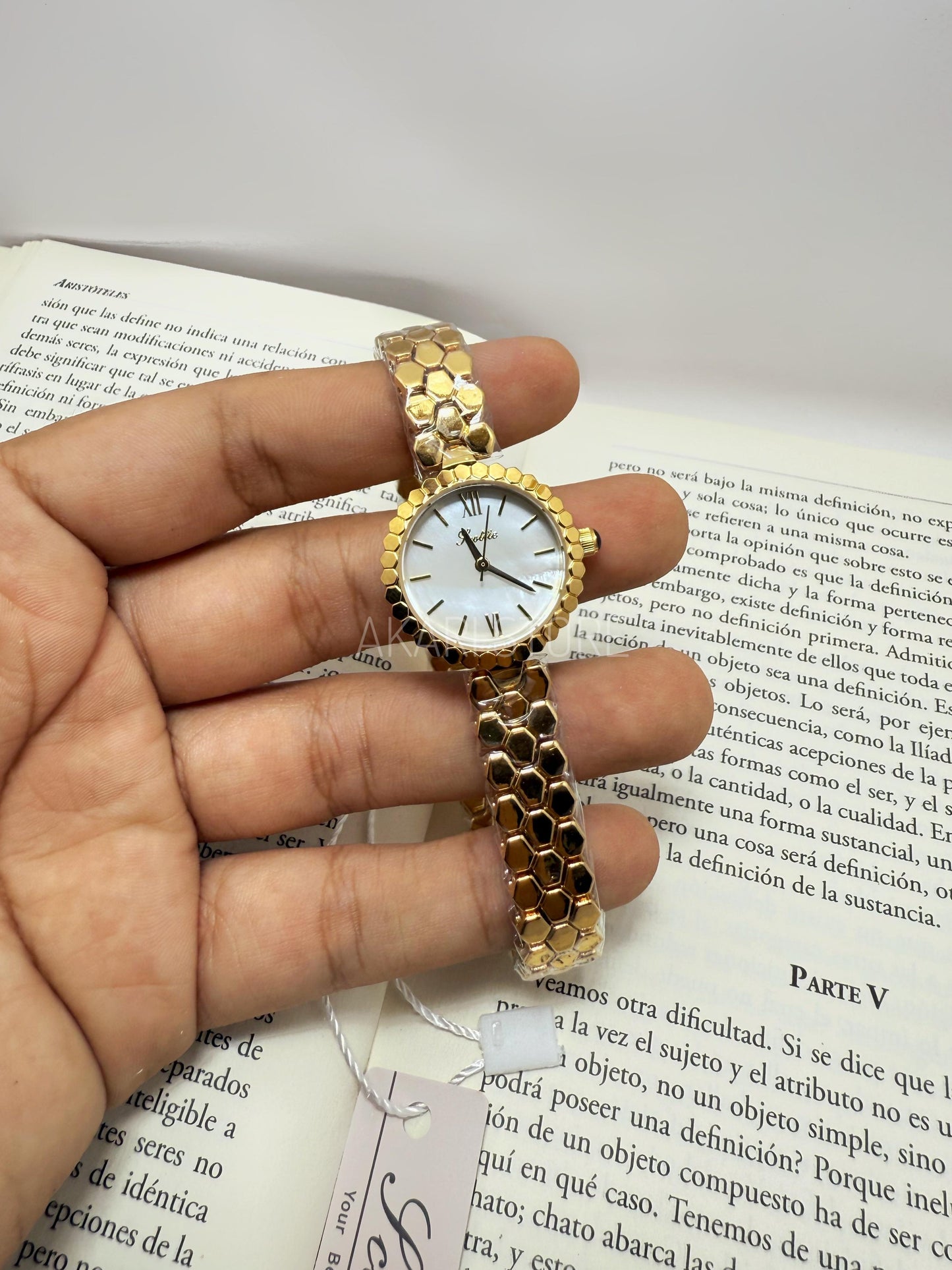 Reloj circular con dial marfil
