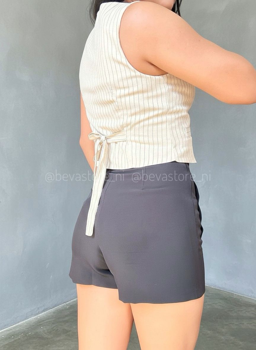 Top tipo chaleco con botones y lazo en la espalda rayado