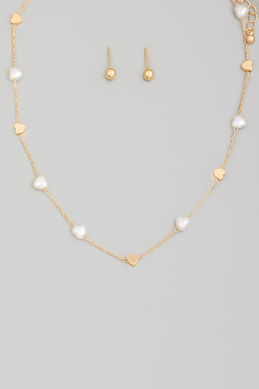 Set dorado de cadena y aretes dorados