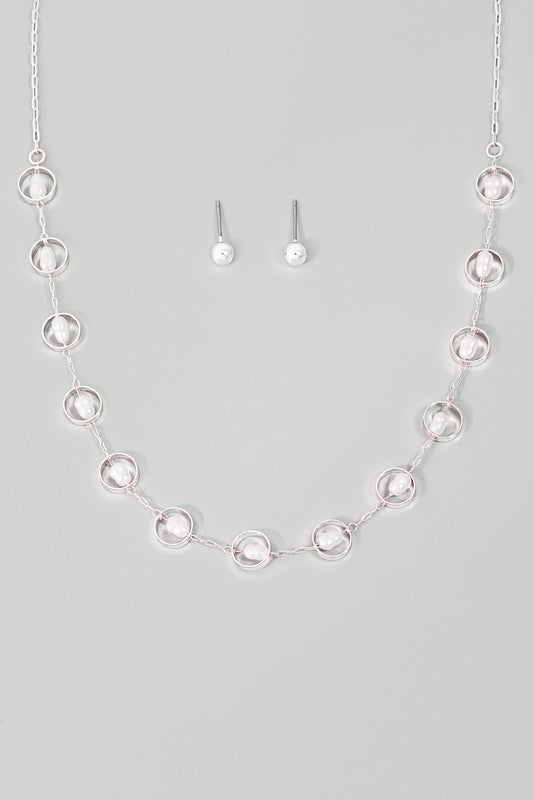 Set plateado de cadena y aretes