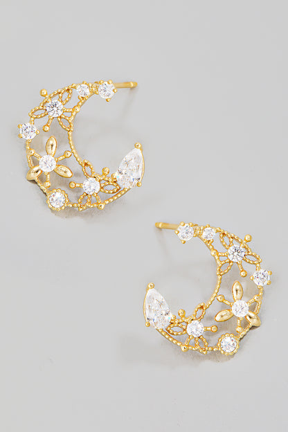 Aretes dorados con luna creciente floral y circonitas