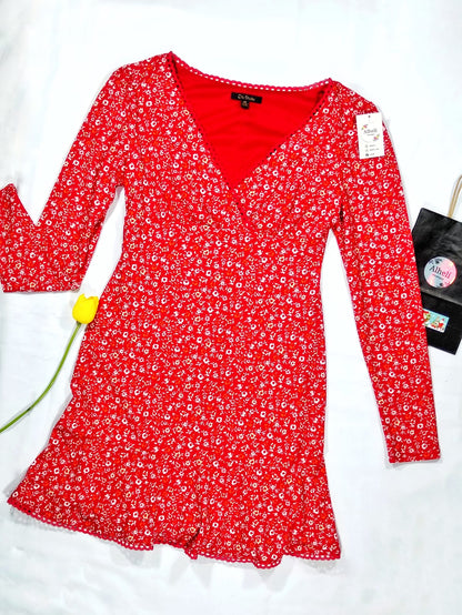 Vestido rojo manga larga.