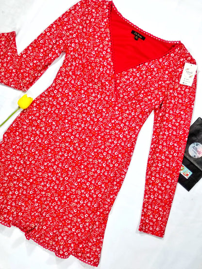Vestido rojo manga larga.