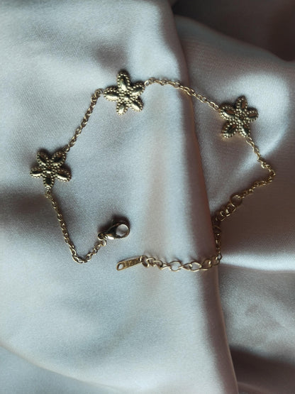 Pulsera color oro flor