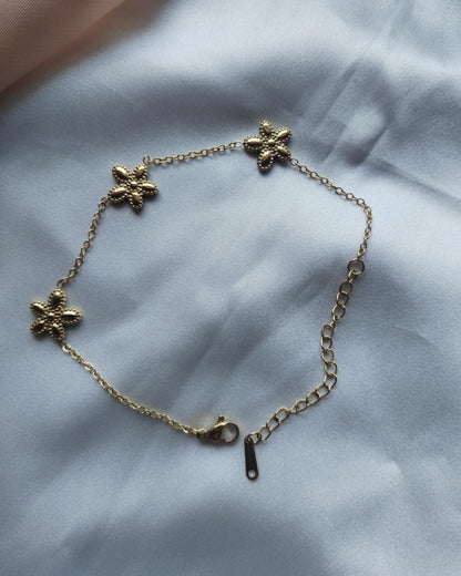 Pulsera color oro flor