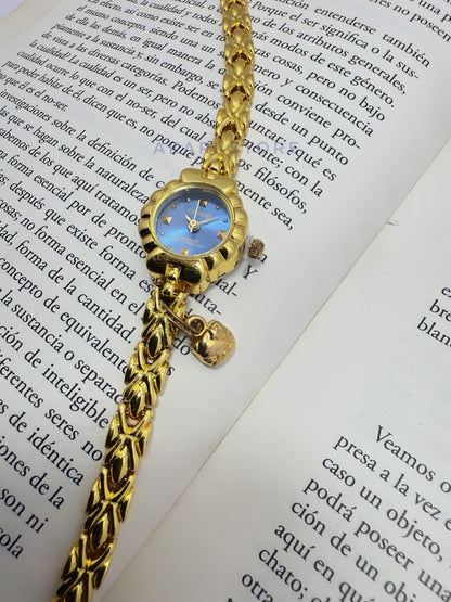 Reloj dorado de flor con dije de Hello Kity