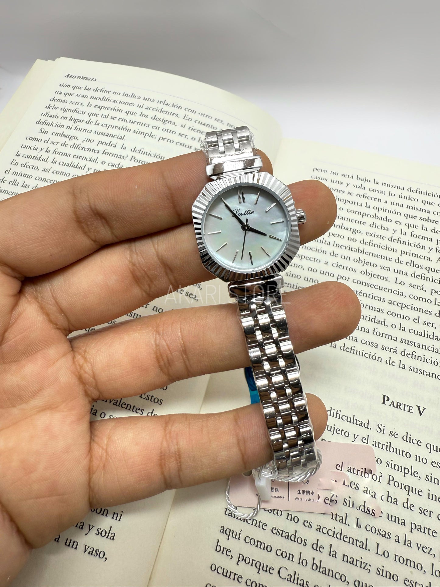 Reloj circular color plata