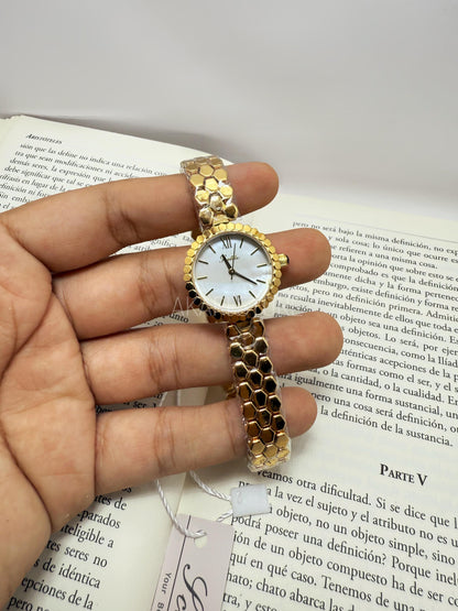 Reloj circular con dial marfil